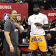 Tyronn Lue, left, of the Cleveland Cavaliers talks with LeBron James of the Los Angeles Lakers after a quarterfinal game of the 2018 NBA Summer League between the Lakers and the Detroit Pistons at the Thomas & Mack Center on July 15, 2018 in Las Vegas, Nevada.